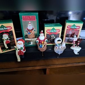 Set of 4 holiday stocking hangers by Hallmark, vintage